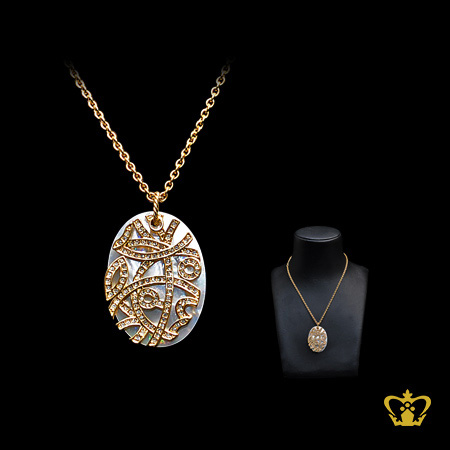 Oval-shape-mother-of-the-pearl-pendant-on-golden-chain-embellish-with-clear-crystal-stone