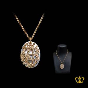 Oval-shape-mother-of-the-pearl-pendant-on-golden-chain-embellish-with-clear-crystal-stone