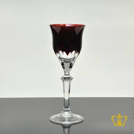 Modest-copper-ruby-tulip-shaped-crystal-liqueur-glass-with-classic-curved-facets-pattern-elegantly-hand-carved-stem