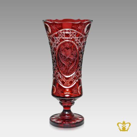 Gorgeous-long-footed-red-crystal-vase-adorned-with-handcrafted-floral-pattern-and-intense-diamond-cuts