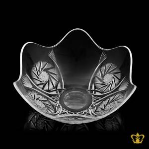 Elegant-crystal-bowl-with-wave-edge-finish-adorned-with-handcrafted-intense-graceful-twirling-star-leaf-cuts