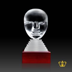 A-Masterpiece-Crystal-Replica-of-a-Twin-Face-stands-on-Crystal-and-Wooden-Base