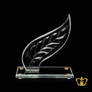 Personalized-crystal-trophy-with-leaf-theme-stands-on-clear-base