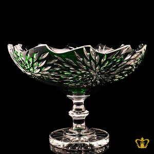 Alluring-sophisticated-green-crystal-footed-bowl-wave-edged-adorned-with-handcrafted-intense-clear-leaf-pattern