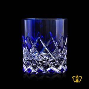 Cobalt-blue-luminous-crystal-whiskey-glass-adorned-with-deep-intense-classy-cut-rising-from-the-bottom
