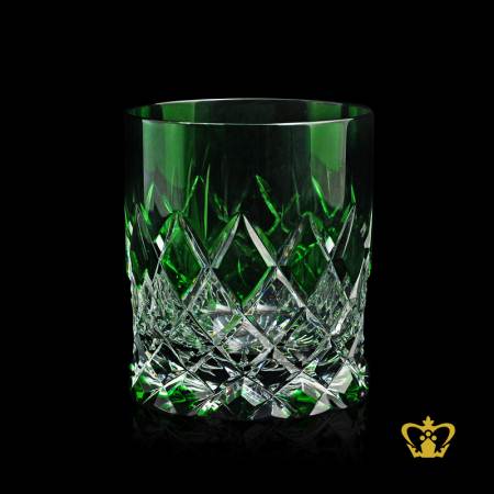 Gorgeous-green-enchanting-crystal-whiskey-glass-adorned-with-deep-intense-classy-cut-rising-from-the-bottom