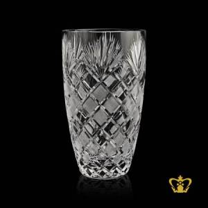 Enchanting-crystal-vase-appealing-with-fetching-handcrafted-cross-cuts-rising-from-the-bottom-adorned-with-frosted-hues-embellished-with-leaf-pattern-on-top-