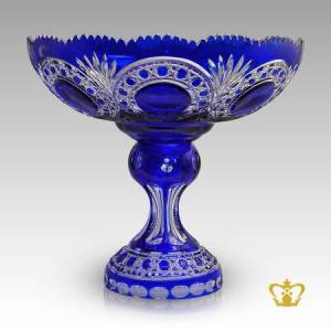 Vintage-style-scalloped-edge-elegant-footed-blue-crystal-bowl-with-intense-star-cuts
