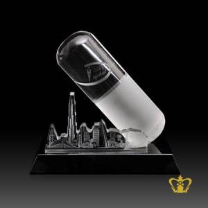 Customized-crystal-capsule-trophy-stands-on-black-base-personalize-text-engraving-logo-base-UAE-famous-gifts