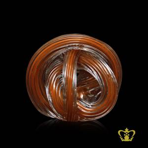 MRT-KNOT-PAPER-WEIGHT-5-5IN-AMBER-CLEAR